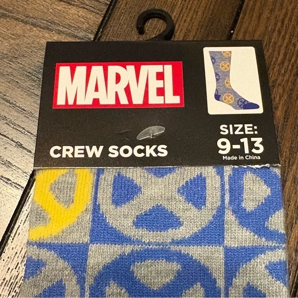 3/$20 Marvel X-Men Crew Socks a Blue Yellow Gray pattern with X-Men 